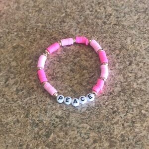 Pink drink peace bracelet